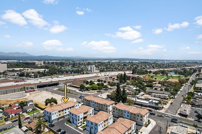 Aerial view of home and nearby I-5 freeway
