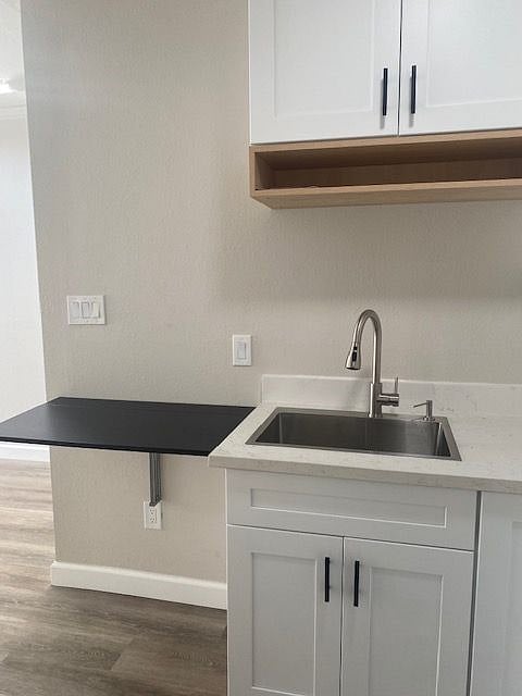 Kitchen includes a foldable table for eating or for work.  Seating stool or chair can be provided as requested.