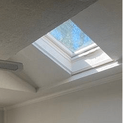 Skylight provides natural light and view to the sky with shade to control light. 