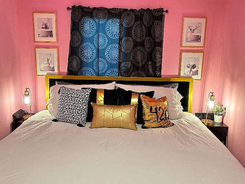Drift into dreamland on our king-sized bed in this charming pink-themed room, complete with a smart TV for your entertainment.