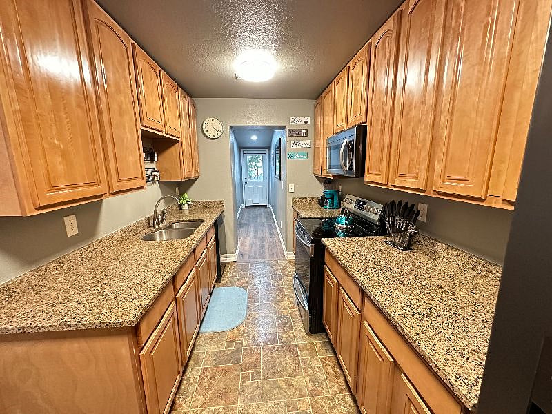Create memorable meals in our kitchen, stocked with utensils and kitchenware.