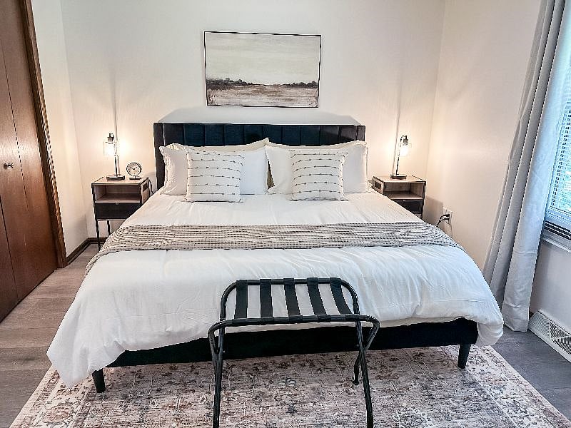 Bedroom 2 Featuring an Elegant Queen Bed & Plush Bedding