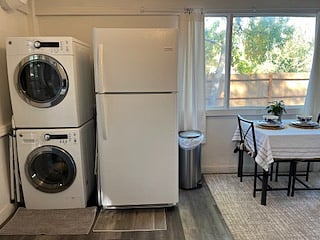 Large washer and dryer available and full sized fridge in kitchen
