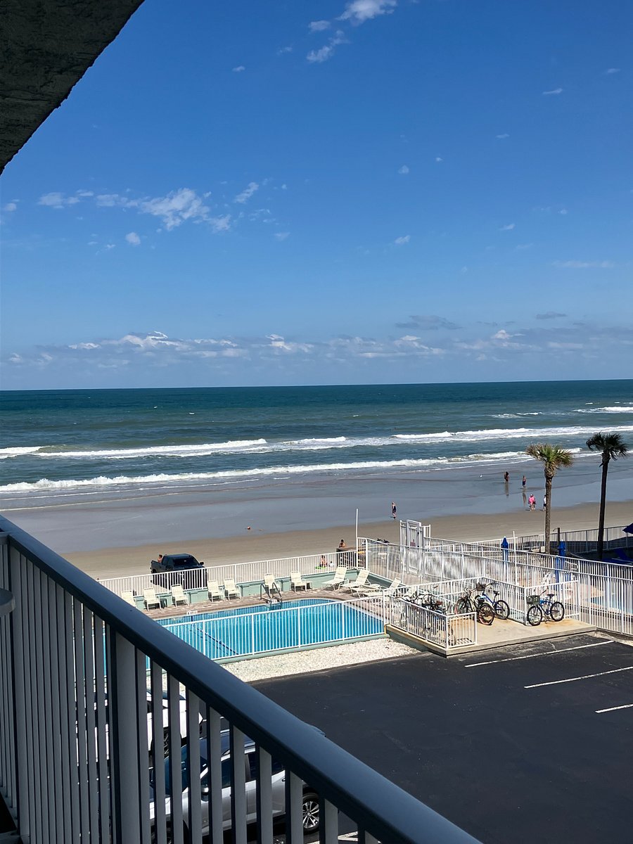 Balcony View of Ocean and Pool. Community Bike Rack (no bikes permitted in building).