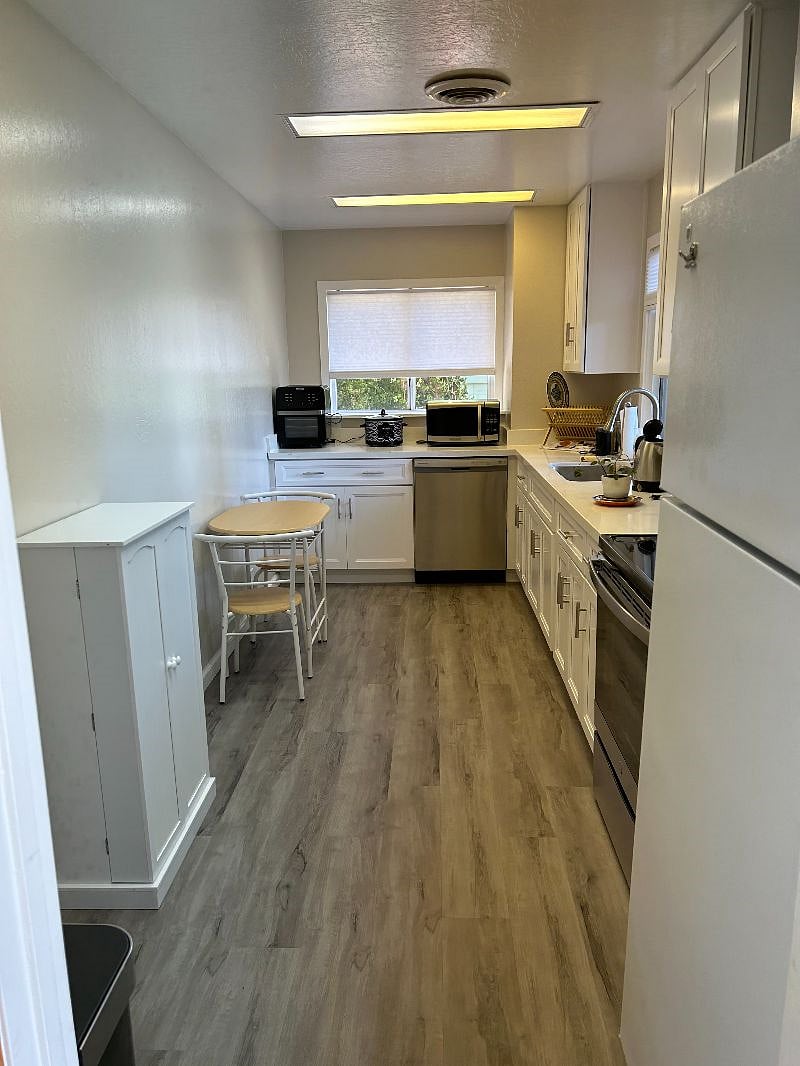 Kitchen with Dishware, Pots/Pans, Untensils, Appliances