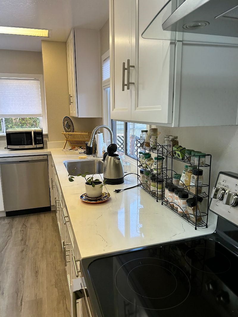 Kitchen with Full Fridge, Oven, Stove, Dishwasher, Garbage Disposal