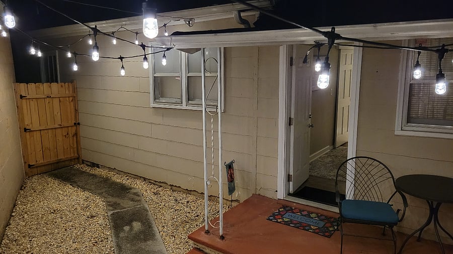 Private gated courtyard with multi colored LED lighting