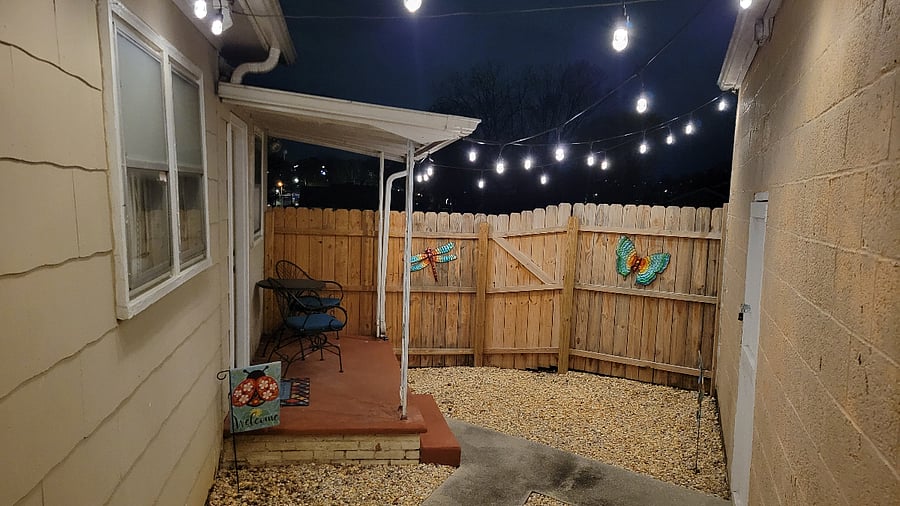 Private gated courtyard with multi colored LED lighting