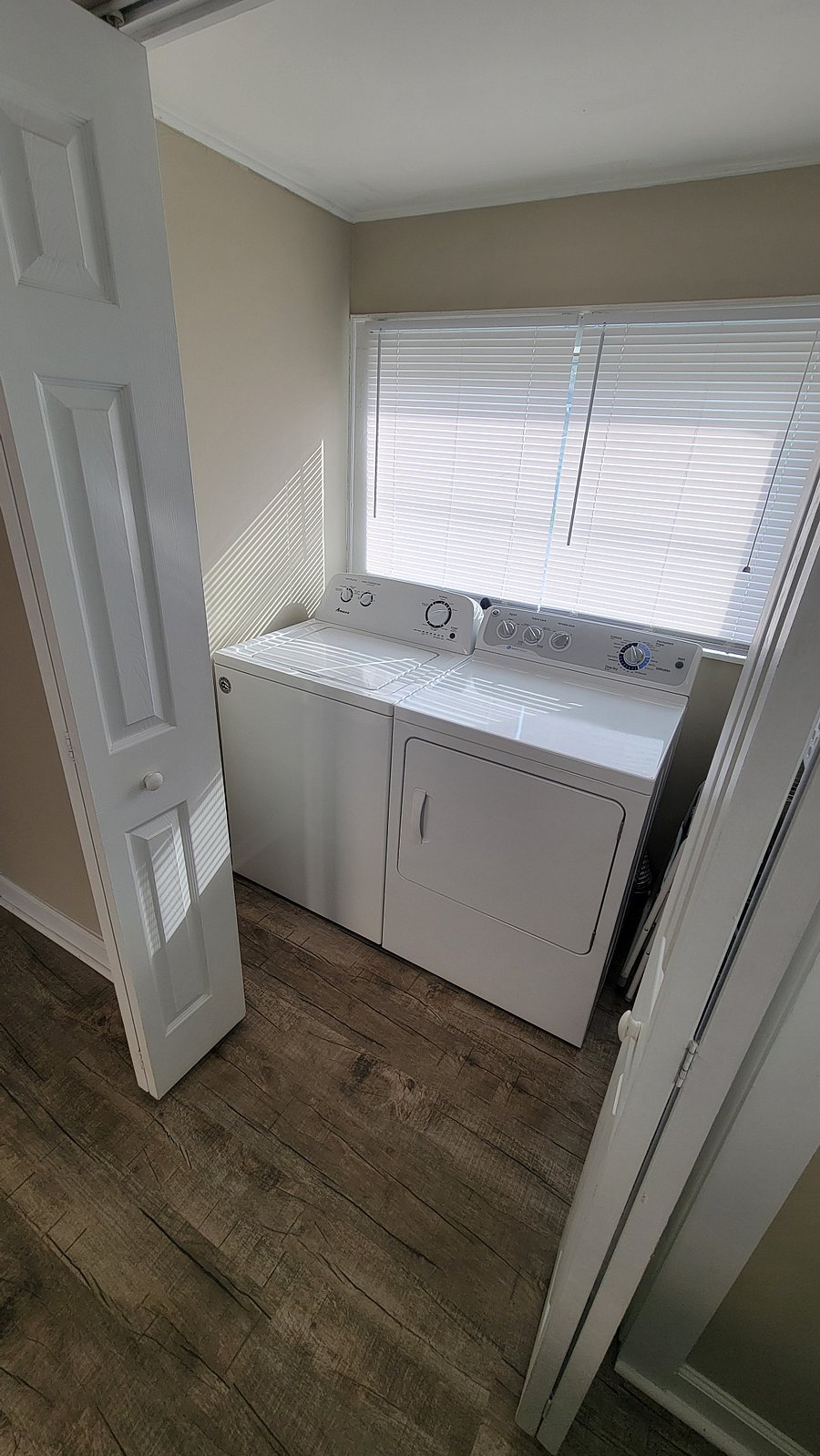 Laundry room with cleaning supplies
