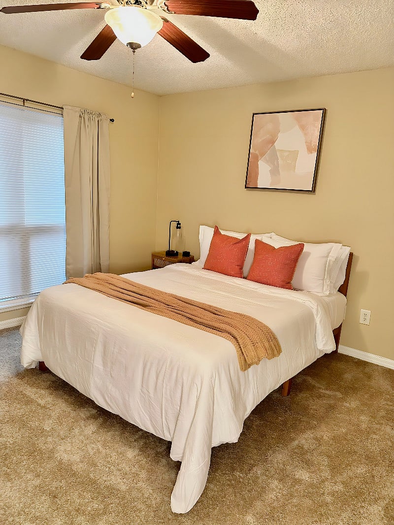 Queen sized bed with Zinus mattress and premium linens for the perfect night's rest.