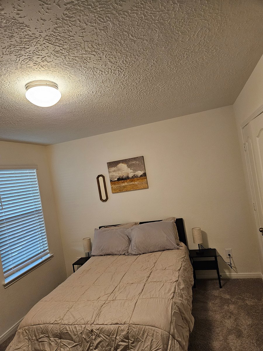 Bedroom number 2. Overlooks the backyard. With a workspace.