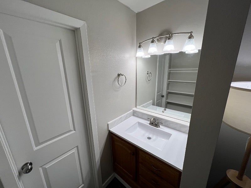 Jack and Jill style vanity area attached to primary bedroom