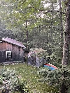 View of kayaks and garage space from top deck