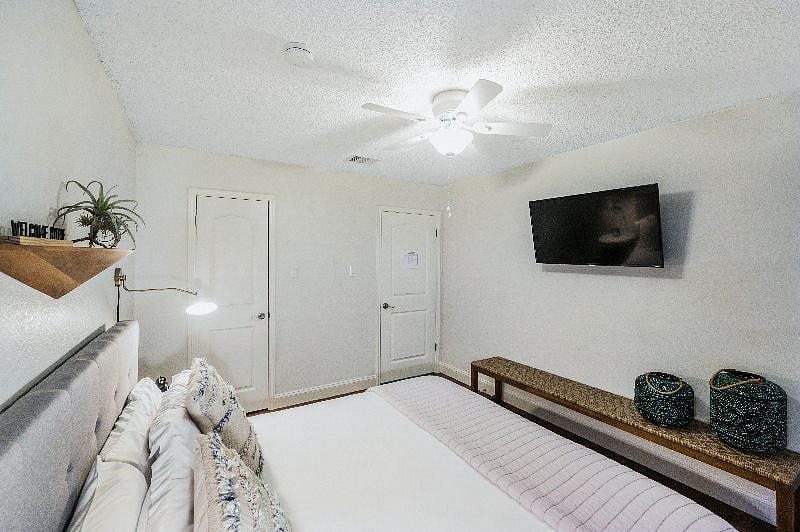 Second master with king size bed and large TV