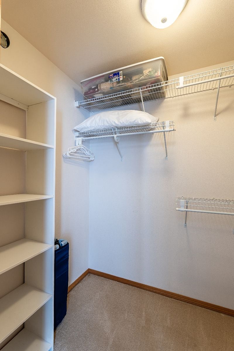 Mt. Denali 5x7 closet with shelving - ample space for hang up and folded clothes and limited storage.
