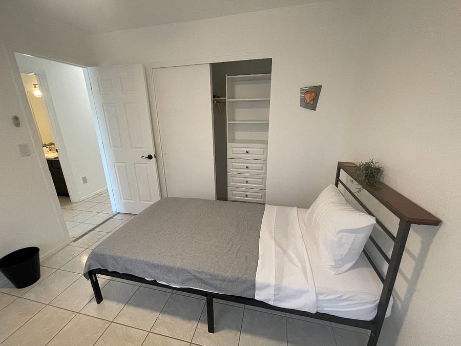 Third bedroom closet with drawers