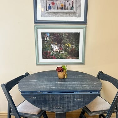 Small kitchen nook with fold down bistro table and chairs