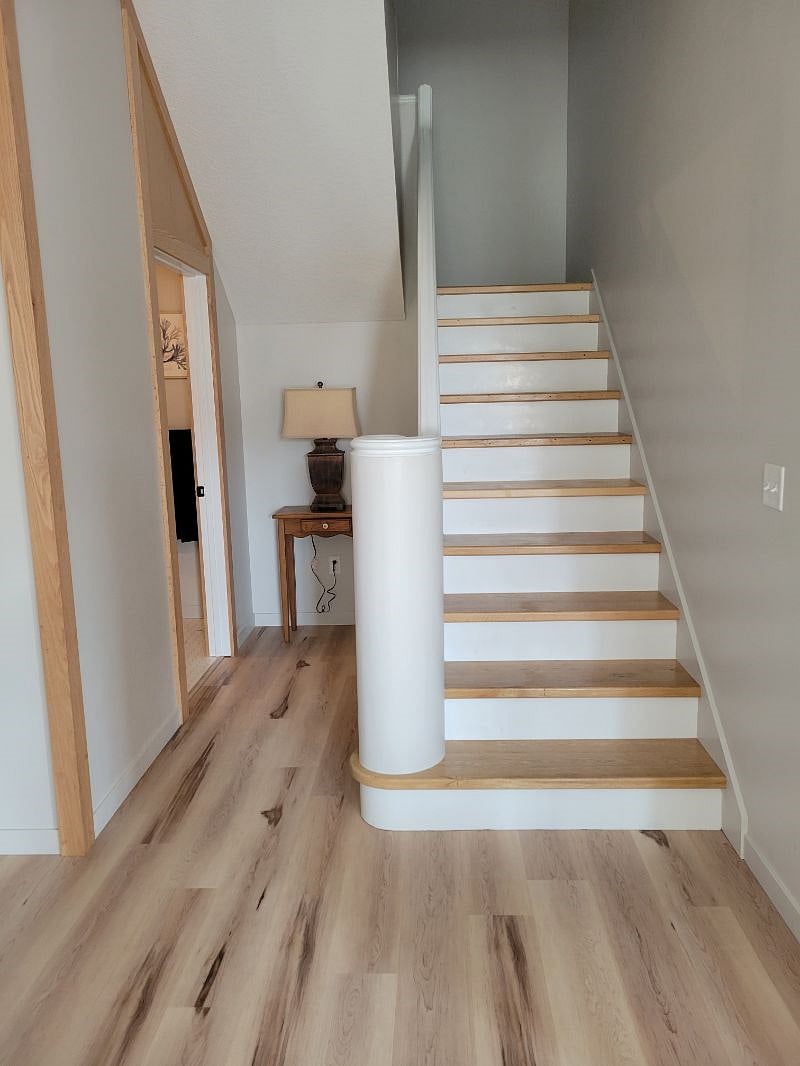 Stairwell to second bedroom. Guest bathroom is the left door.