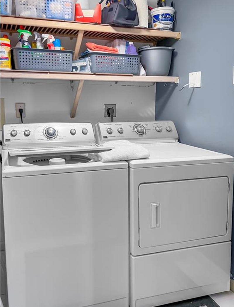 Laundry room with full size washer and dryer