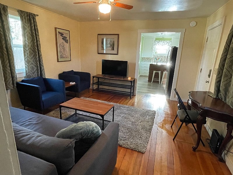 Living room, picture taken from bedroom door area.