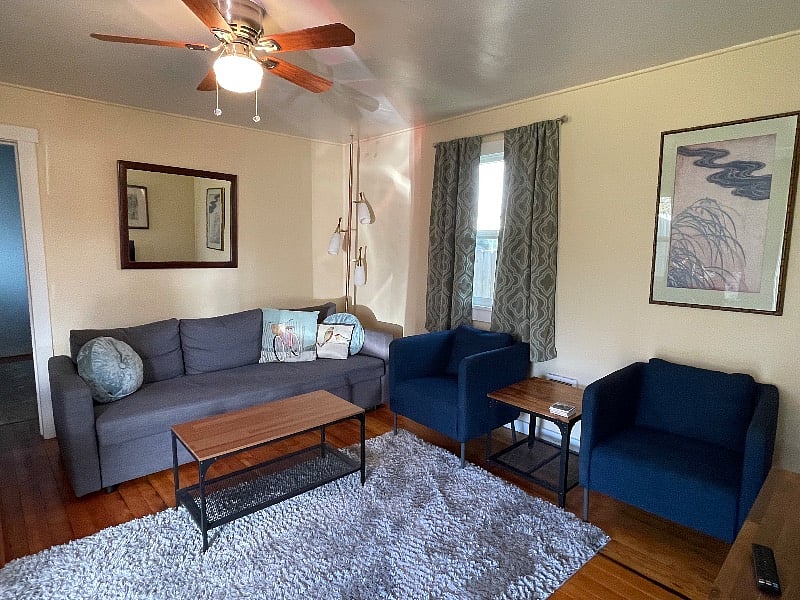 Living area, couch facing tv not pictured.