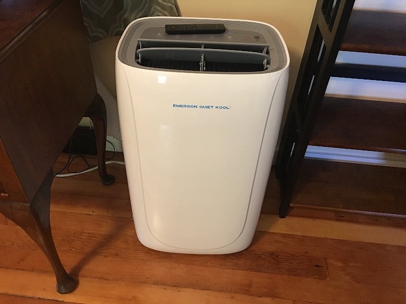 AC which is plenty enough for the size of the home.  Positioned near the bedroom door.  