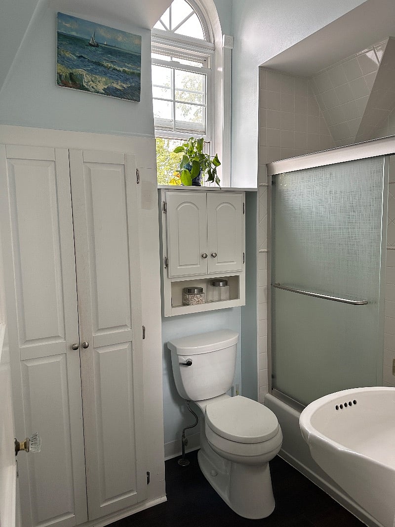 Sparkling clean full bathroom with large closet
