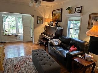 Living room with lovely tuned piano