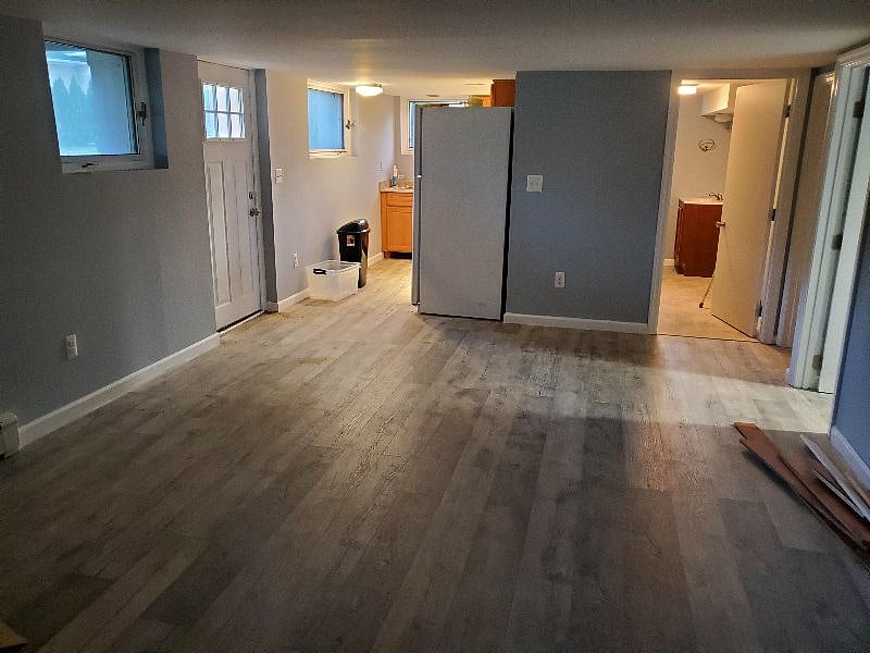 Living Area with view of kitchen and bathroom