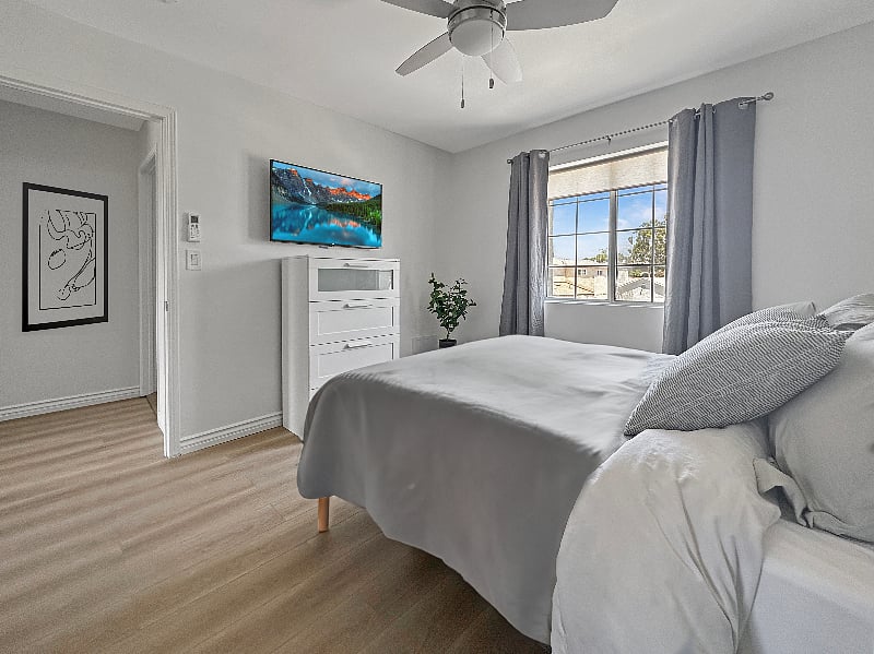 Blackout curtains and 4K TV in the bedroom