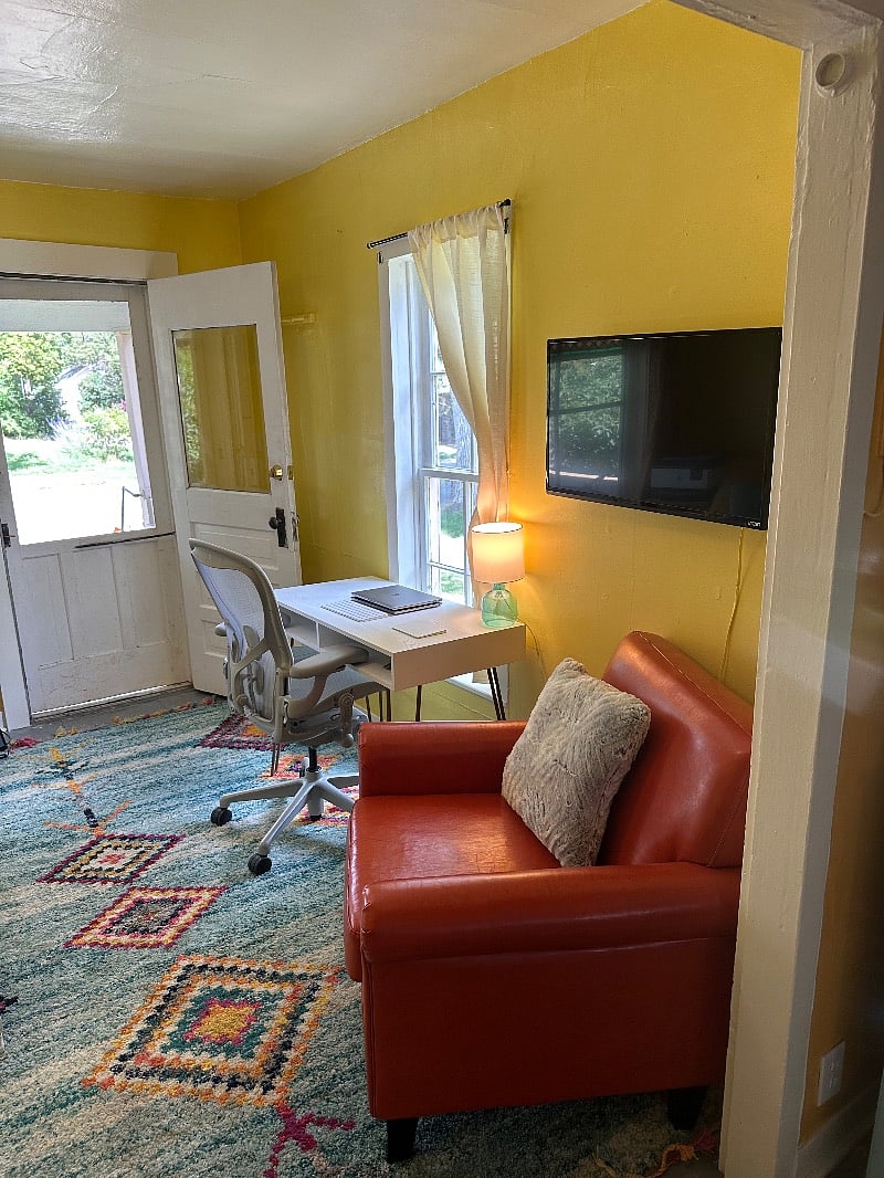 Writing desk and tv in living room