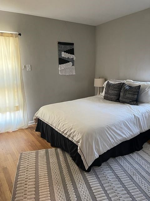 Queen Bedroom, french door access to Backyard 