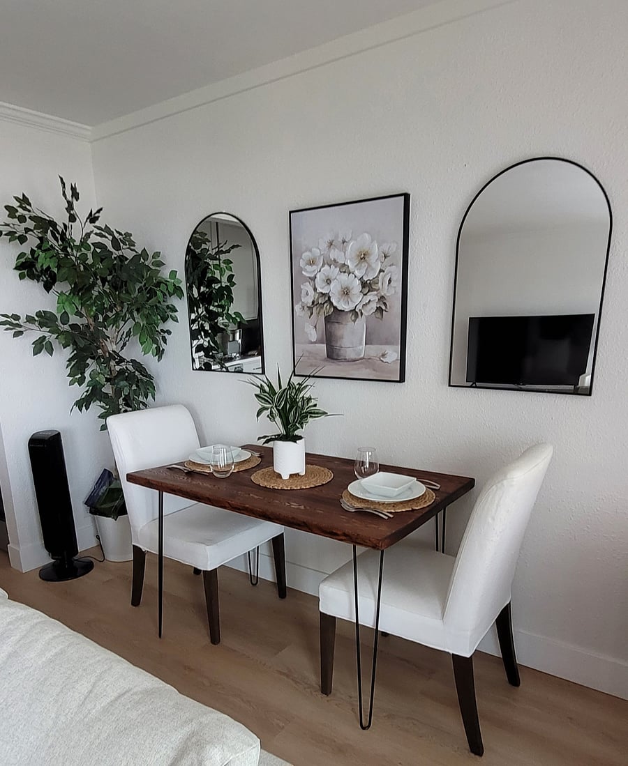 Table can be pulled out to seat 4. All 4 chairs present.