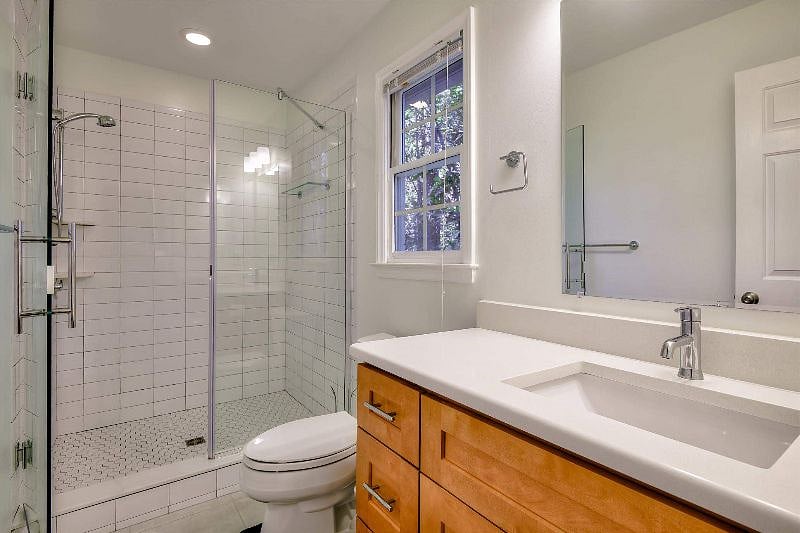 En suite master bath with walk-in shower.