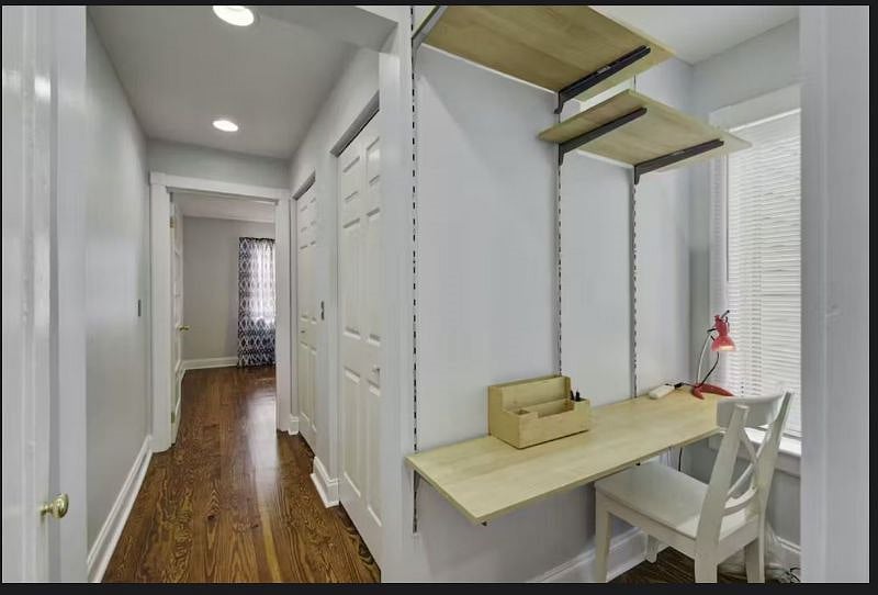 Private master suite offering a peaceful retreat with Smart TV, en-suite bathroom,  queen sized bed, double closets and work station. 