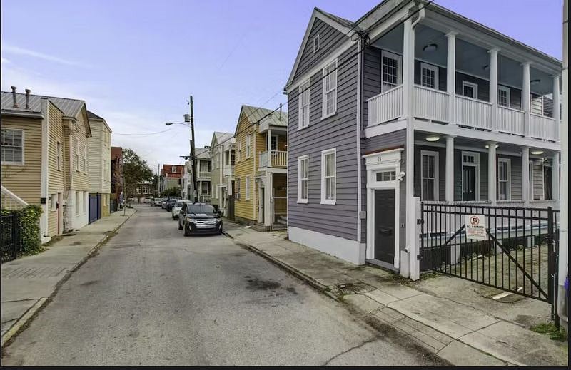 1 off street parking behind the fence 