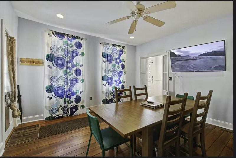 Bright dining room with seating for 8perfect for sharing meals or spreading out to work. Includes direct access to the backyard."