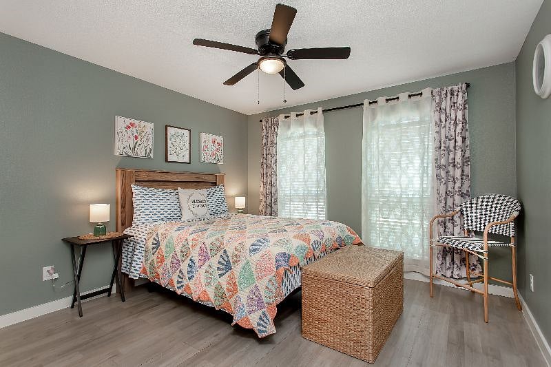 Good size secondary bedroom (#2) on the other side of the house from master; TV & Writing Desk (#2) added to this room.