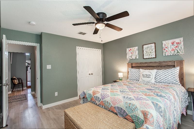 Good size secondary bedroom (#2) on the other side of the house from master; TV & Writing Desk (#2) added to this room.