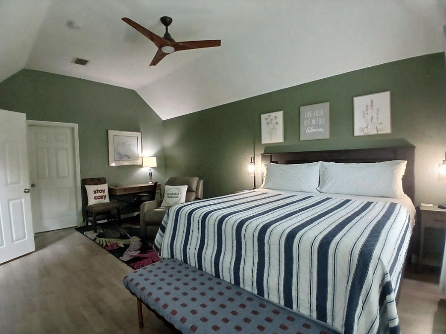 Spacious master-King bed, offers a additional area for a writing desk (#1), leather recliner added for TV watching. Vizio Smart TV.