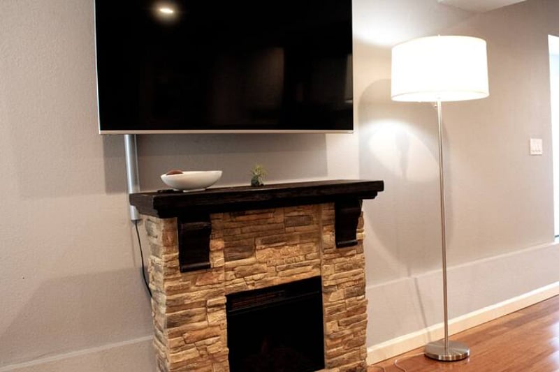 55 inch smart TV and electric fireplace with thermostat