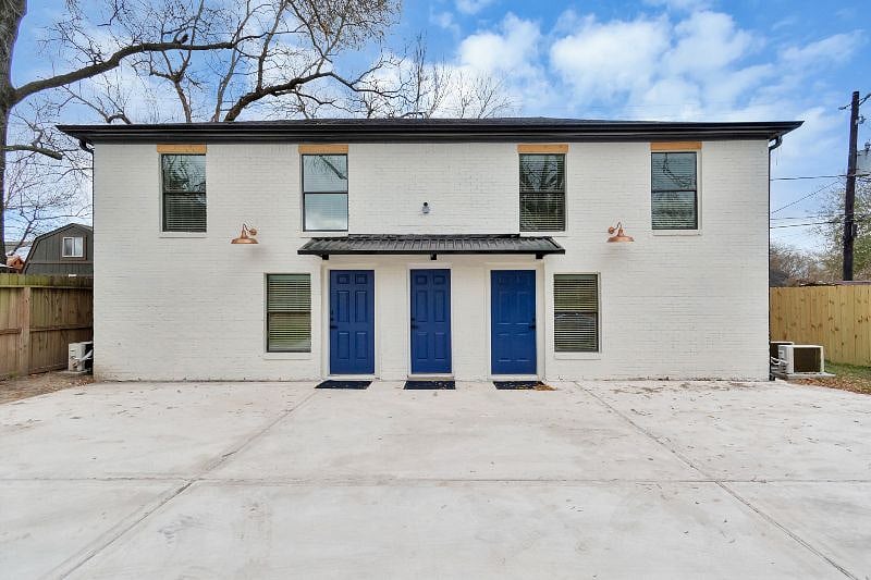 Exterior of building. Parking right in front of your apartment.