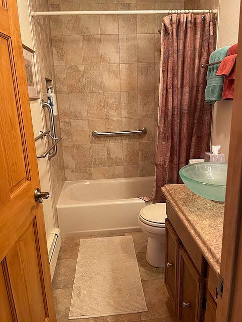 Upstairs full private bathroom adjacent to BR #1 and laundry.