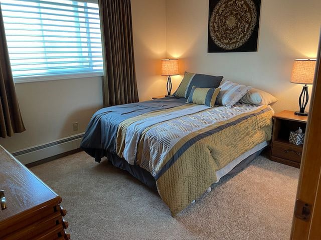 Bedroom #1 upstairs with double/full comfy bed and mirrored closet