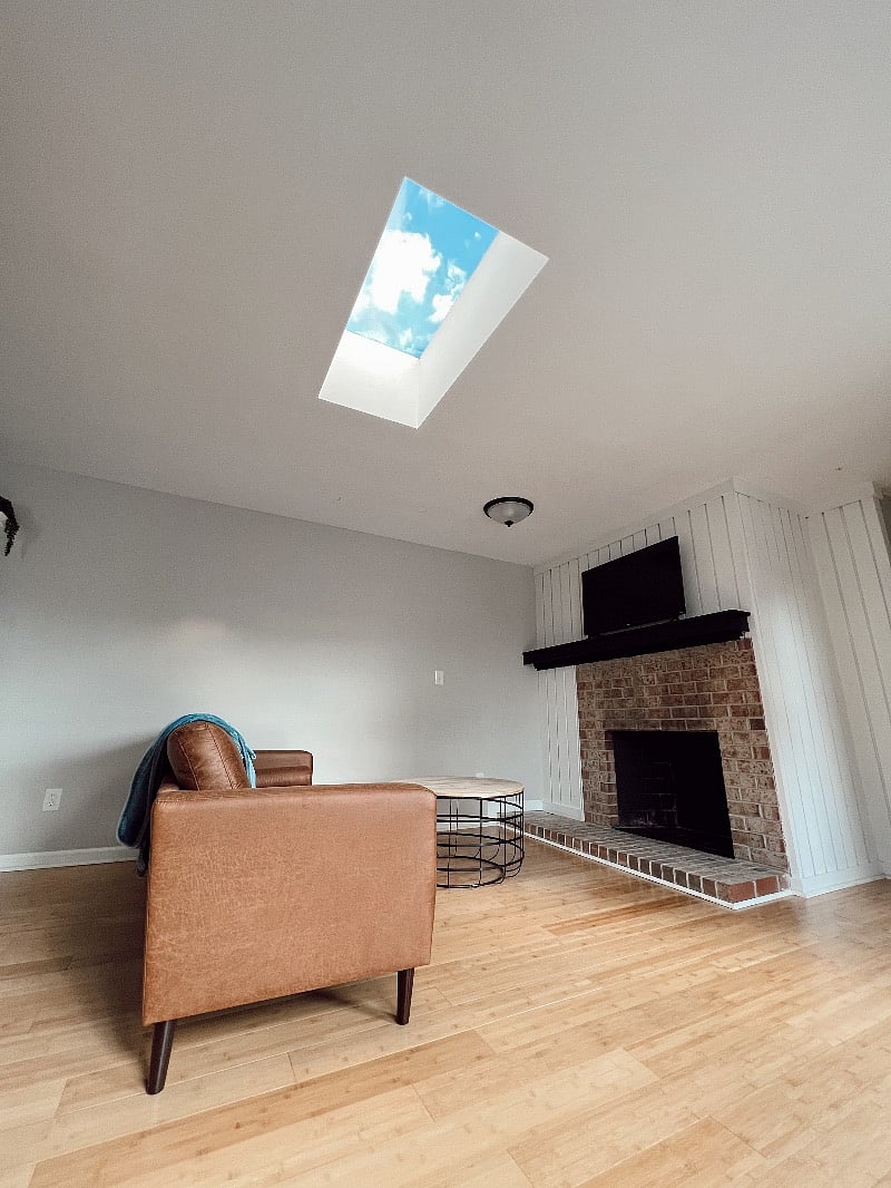 High ceiling and a sky-light allow for beautiful natural light!