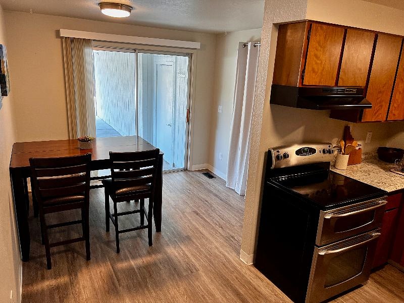 Dining room with exterior entrance to carport.