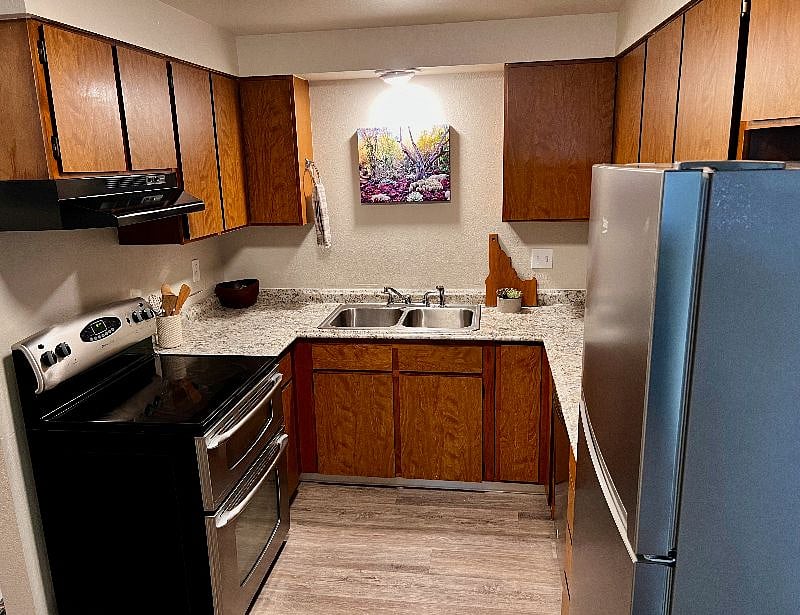 Kitchen with newer appliances.