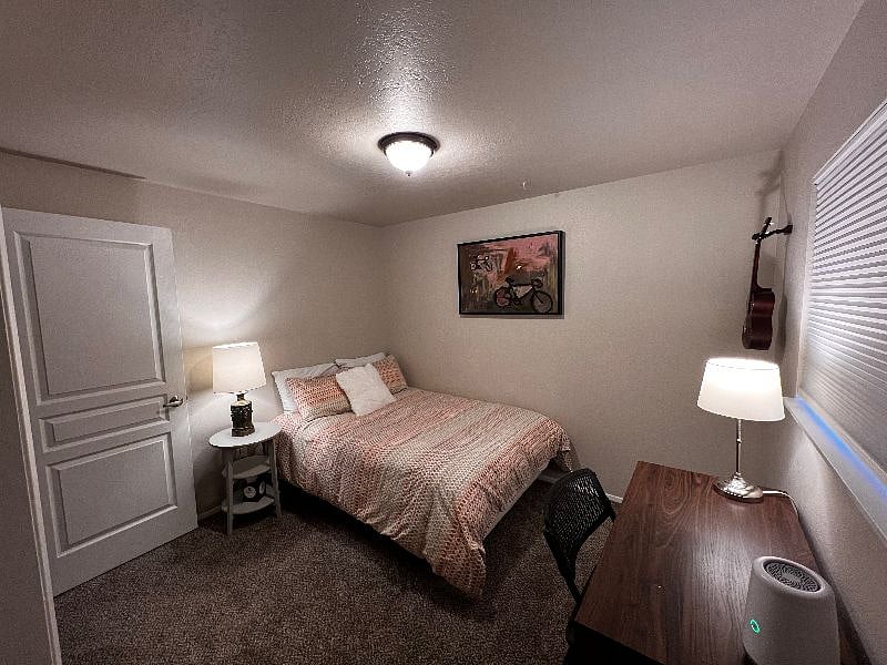 Guest bedroom with full-size bed.