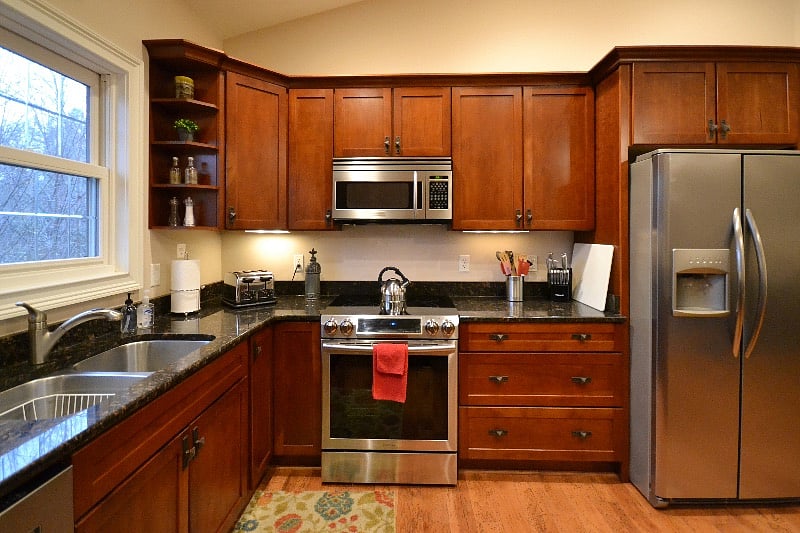 Gourmet kitchen with stainless appliances and granite countertops