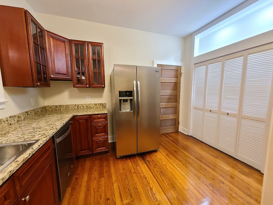 Kitchen with granite countertops.